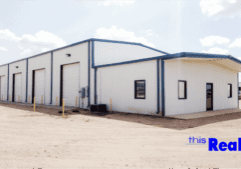 A large building with two doors and a door way.